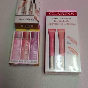 Assortment Of Clarins, Burt's Bees, And Ilia Make Up